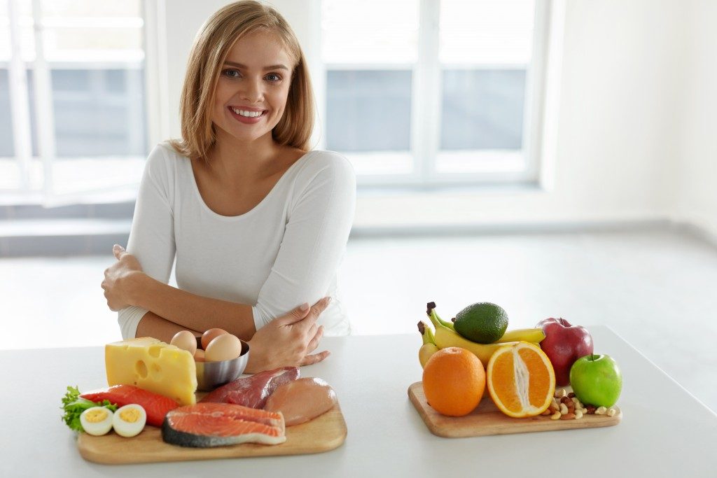 a woman with healthy food