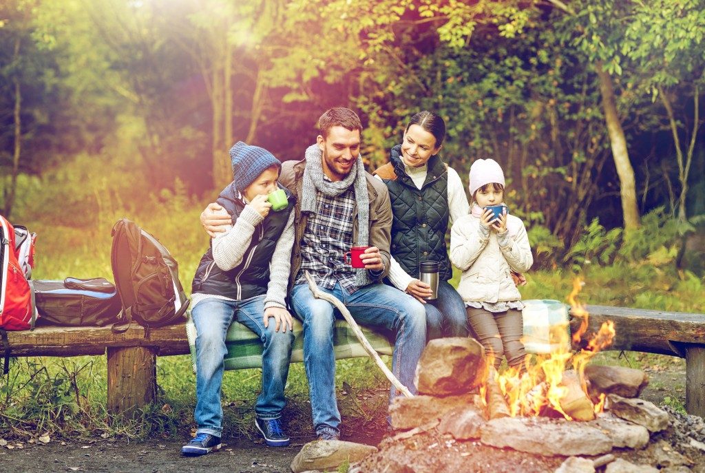 Family in front of a bonfire