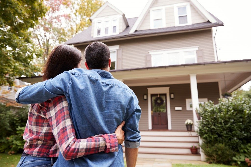 couple looking at their new home