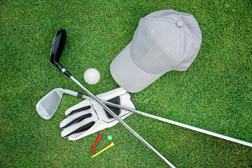 Golf equipment on green grass