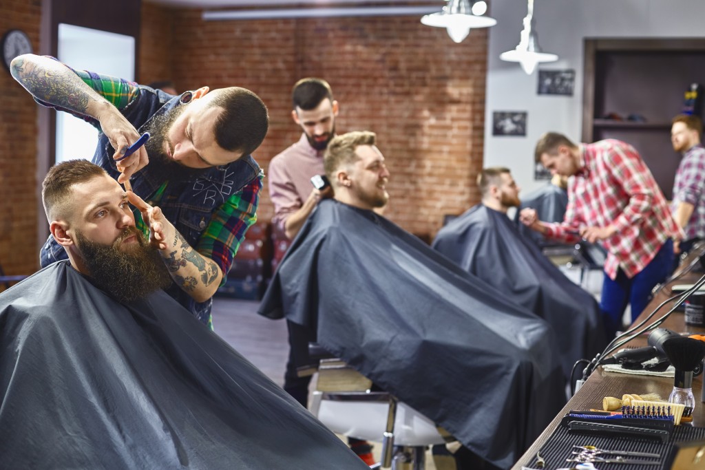 men getting hair cut