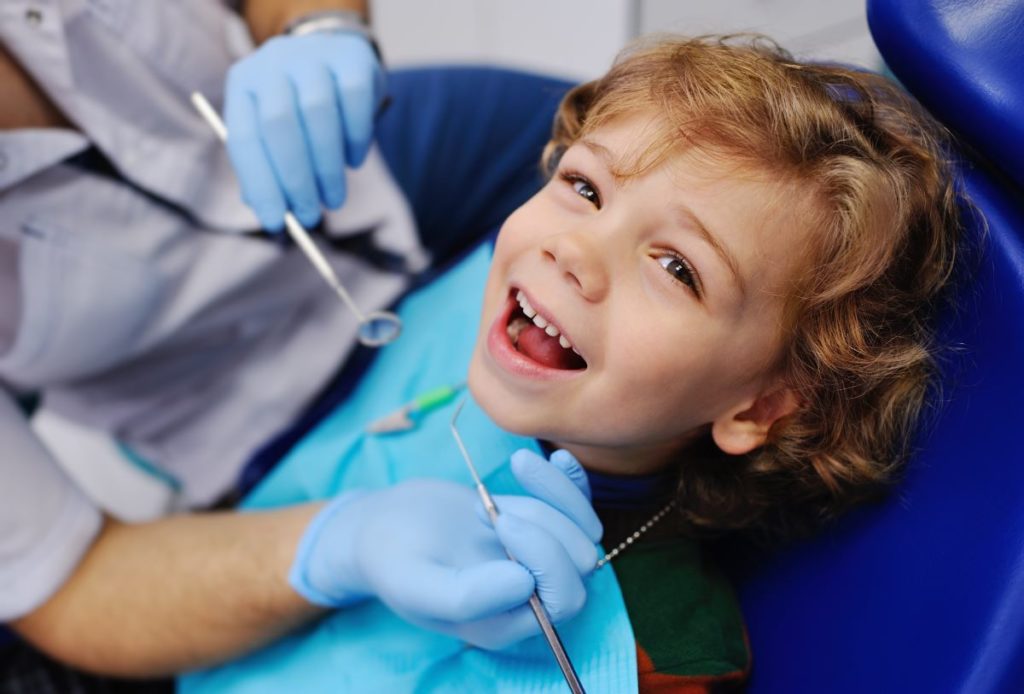 child at dentist