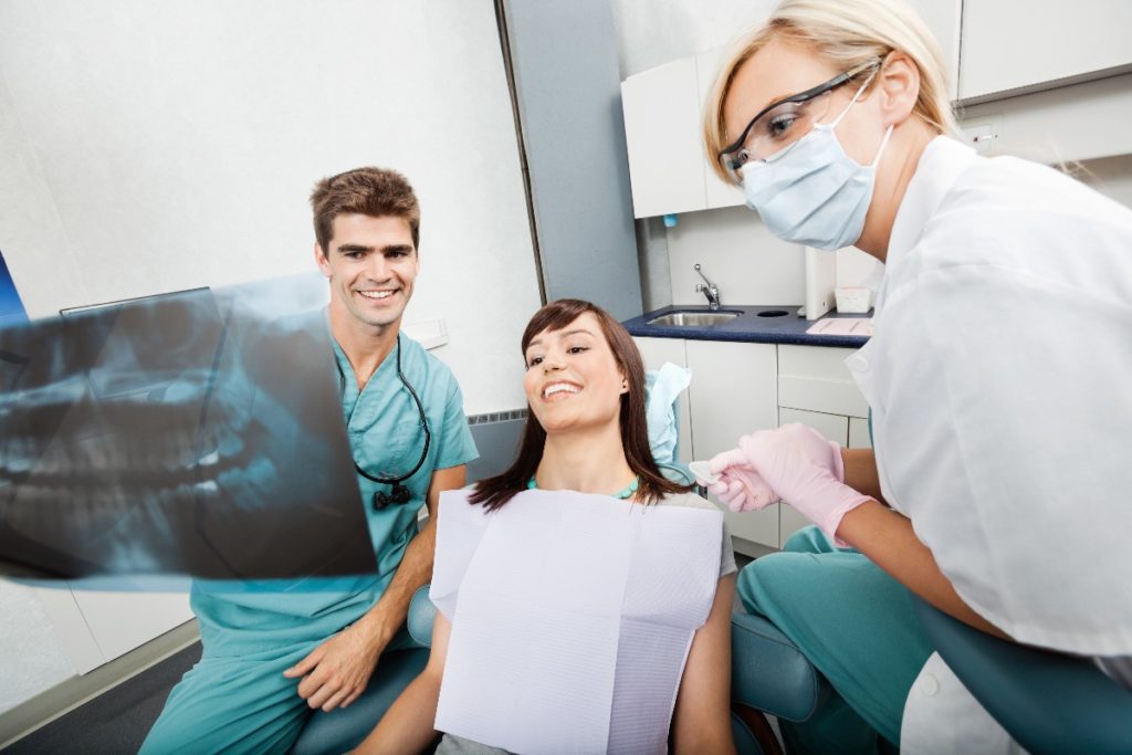 dentists and a patient