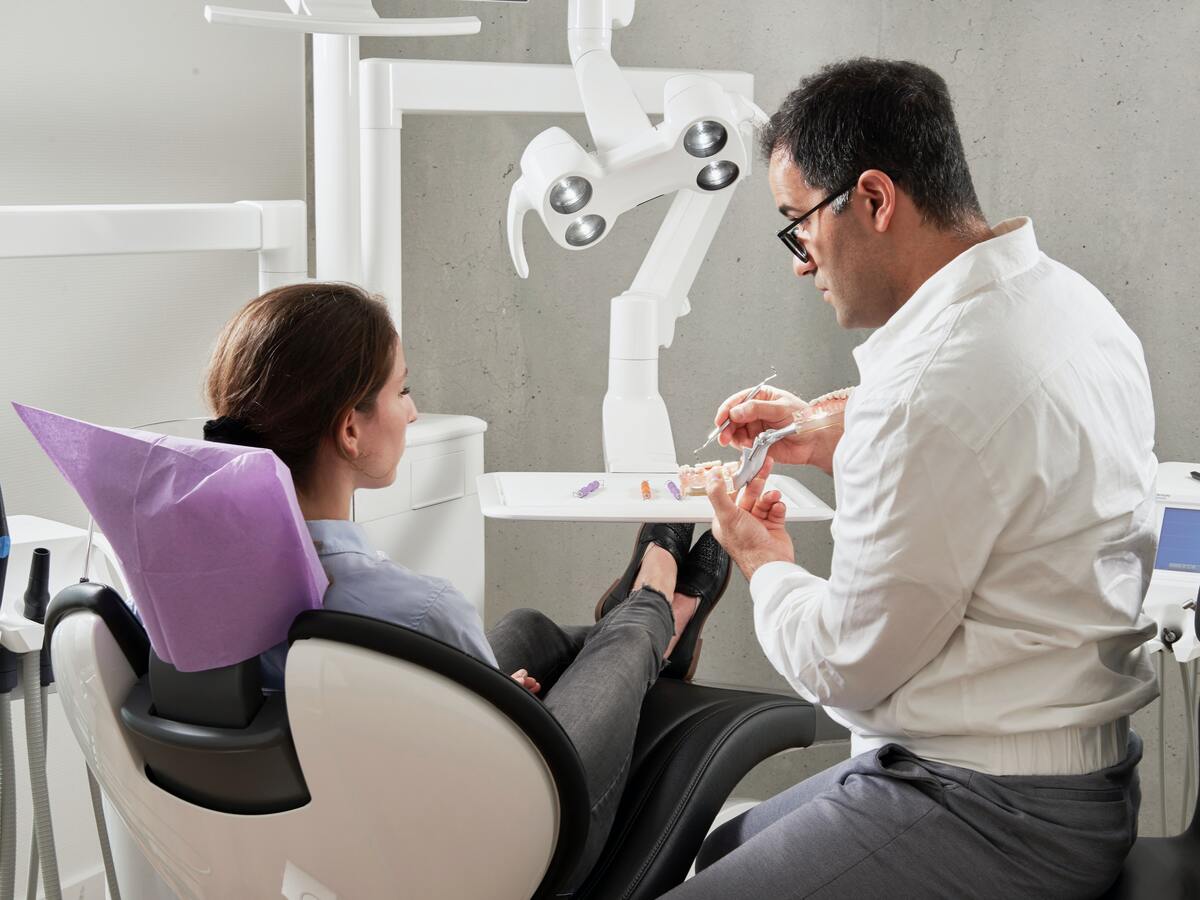 dentist assessing patients condition