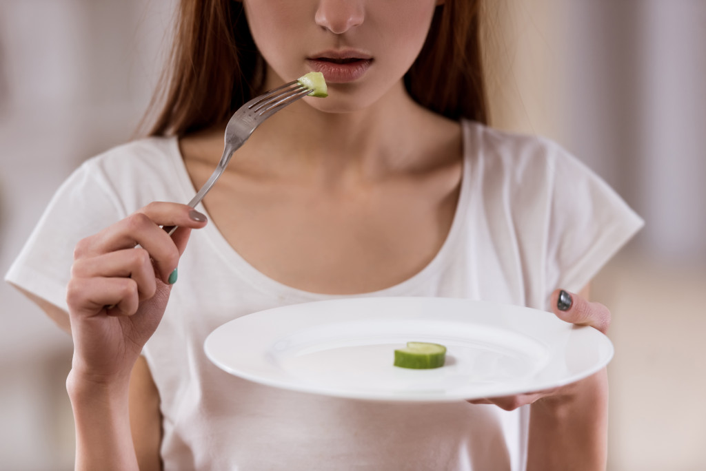 Eating minimally due to anorexia