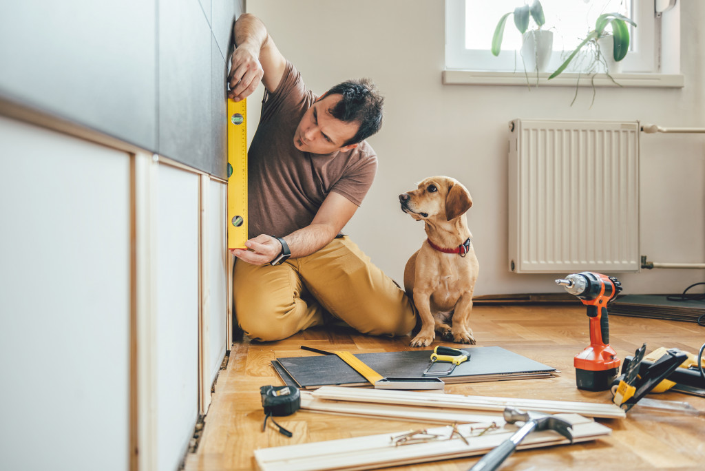 a man improving his home