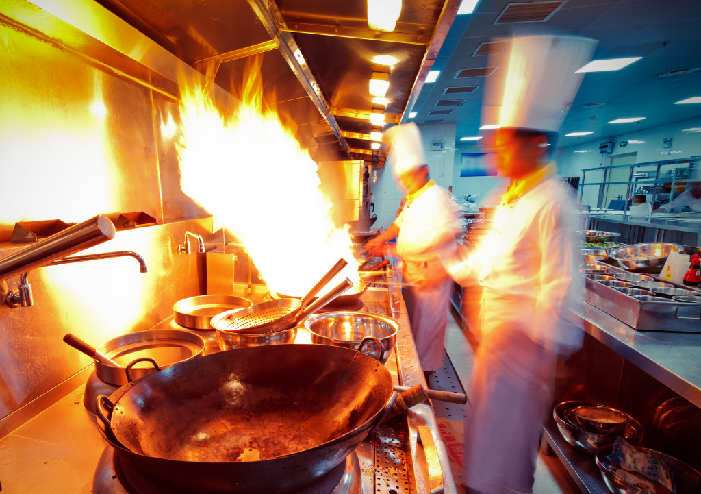 Wok cooking in Chinese restaurant