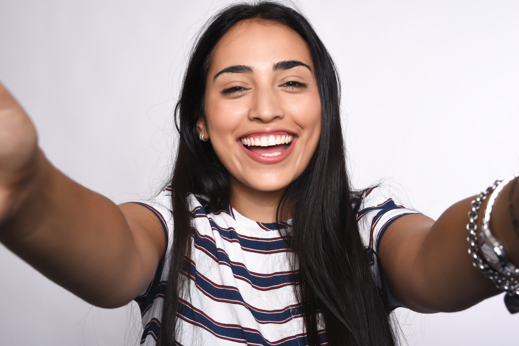 young woman feeling positive