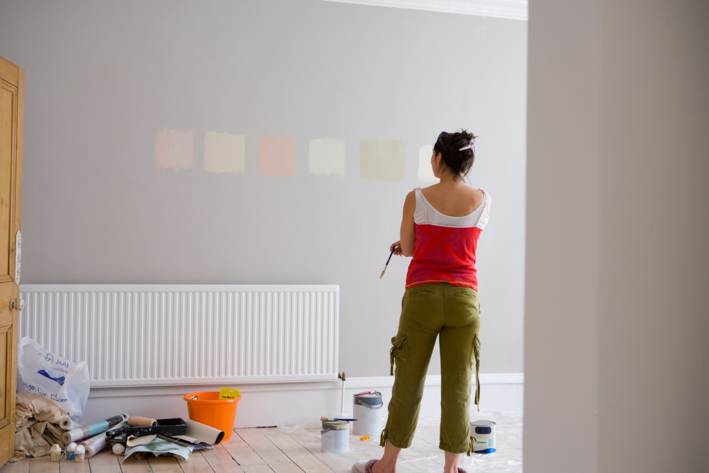 woman looking at color samples