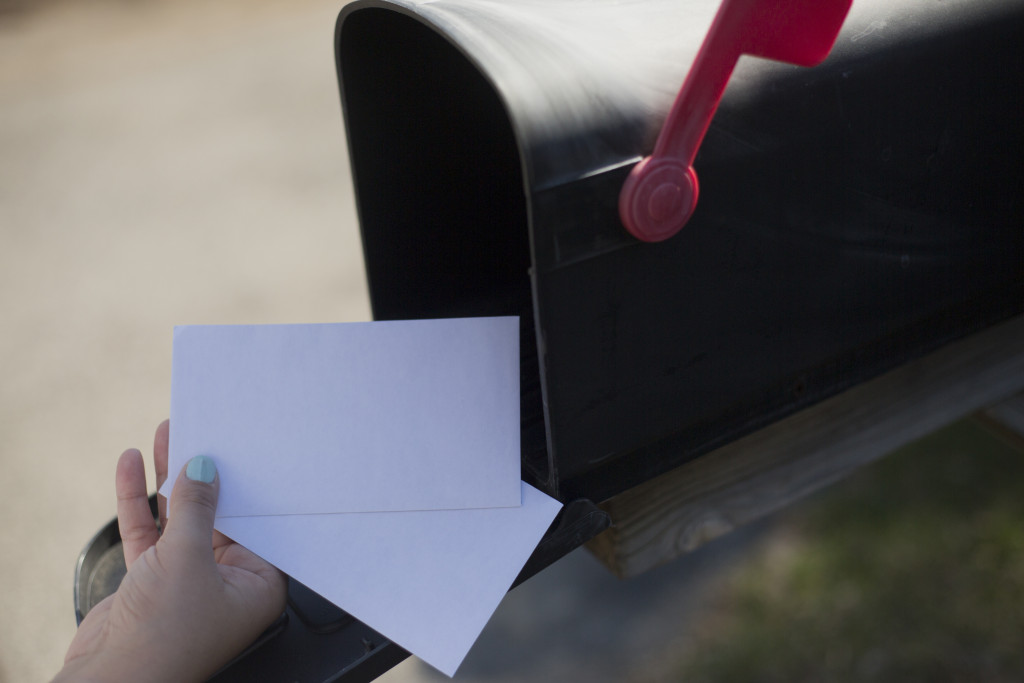 Letters placed inside a mailbox