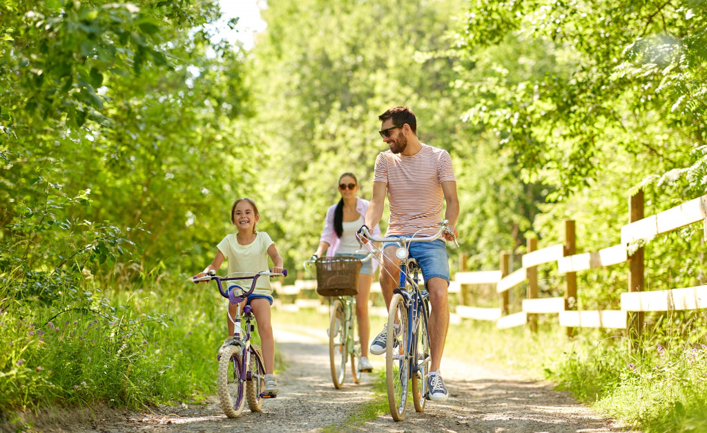 complete family biking outdoor green environment