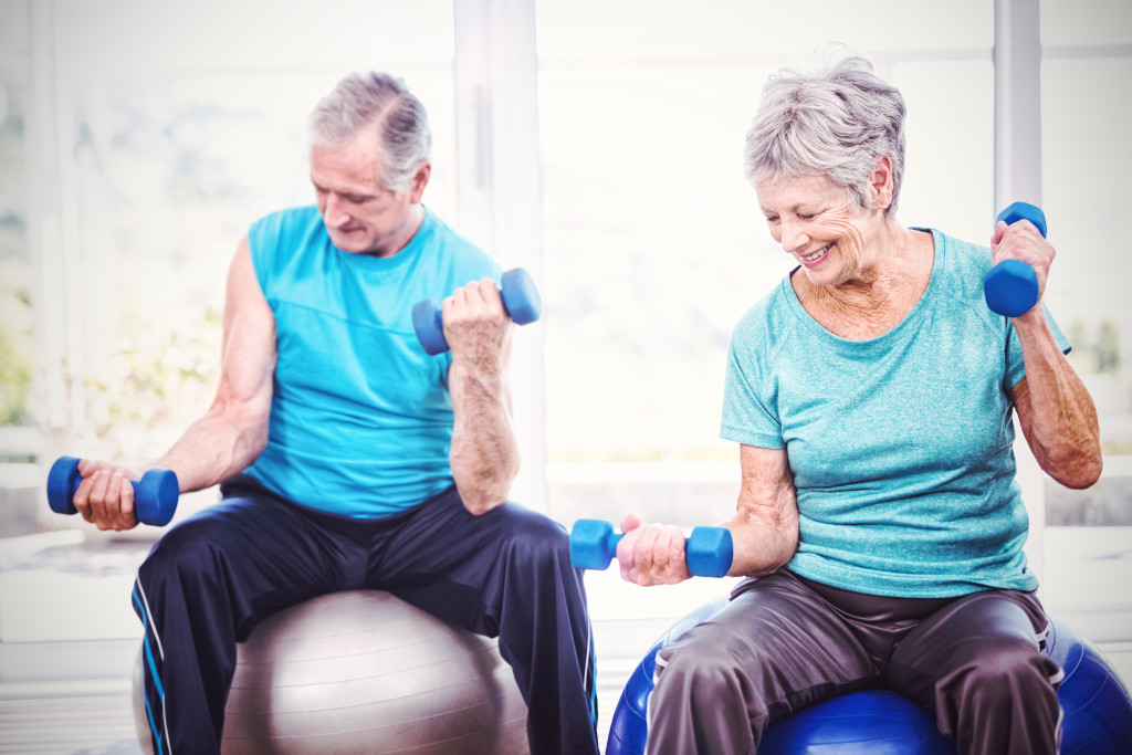 A senior couple working out together