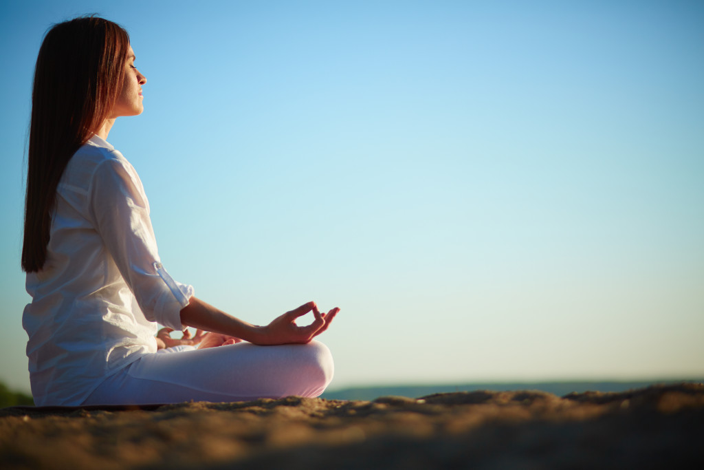 a woman doing yoga