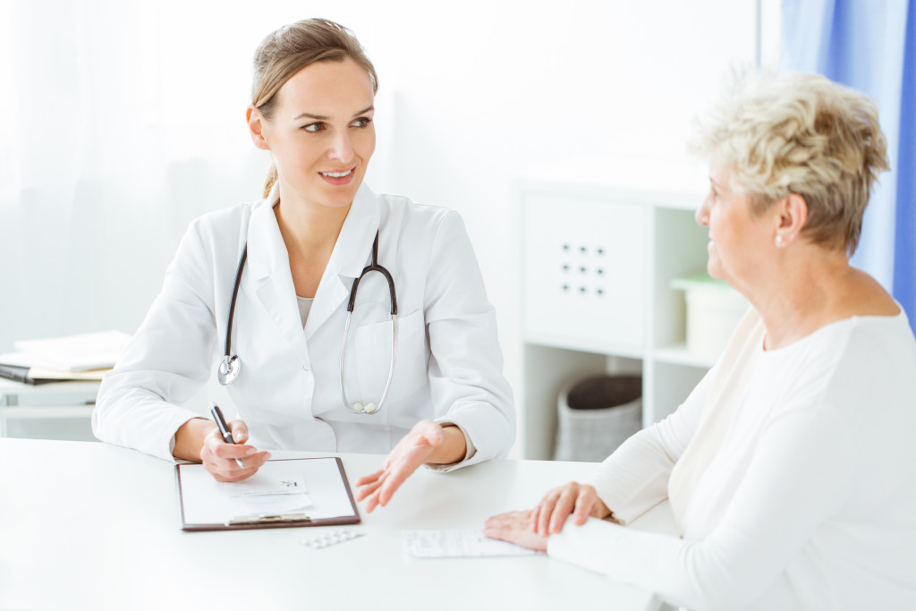 older female patient with her doctor