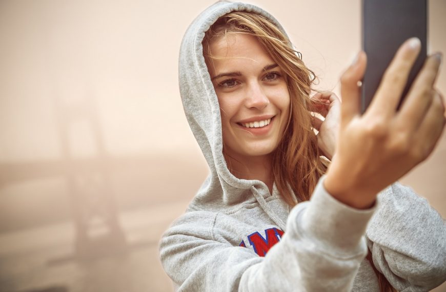 a woman taking a photo of herself