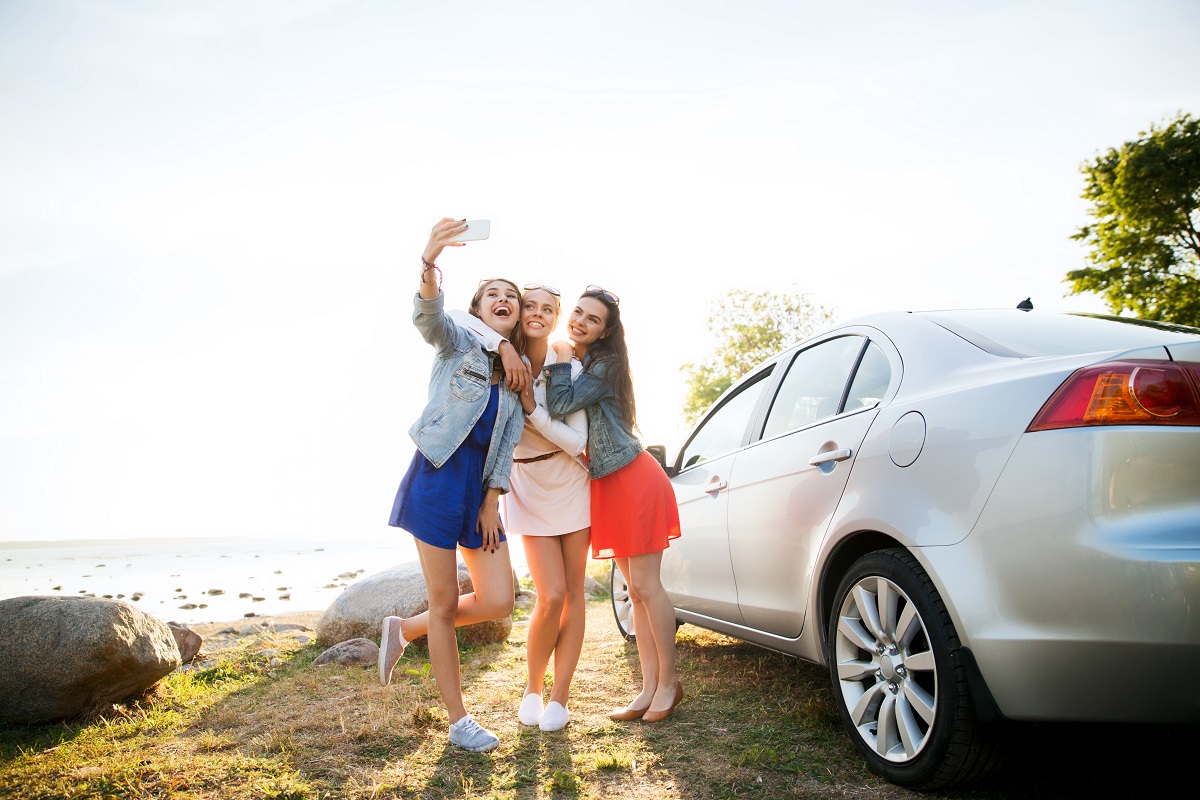 three friends stop over to take a selfie 