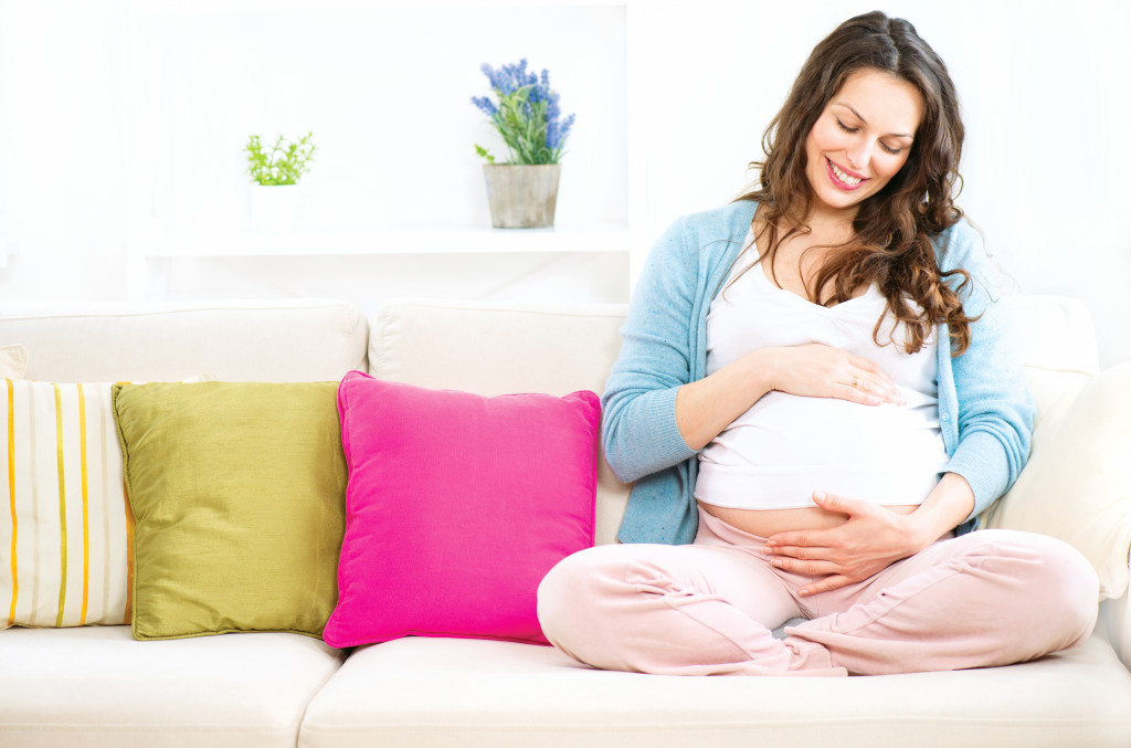 Pregnant woman on couch