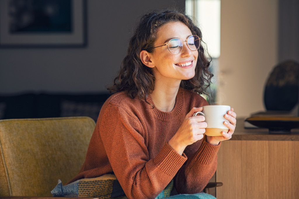 a woman taking a break with coffee